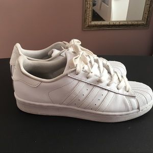 All white adidas superstar shoes